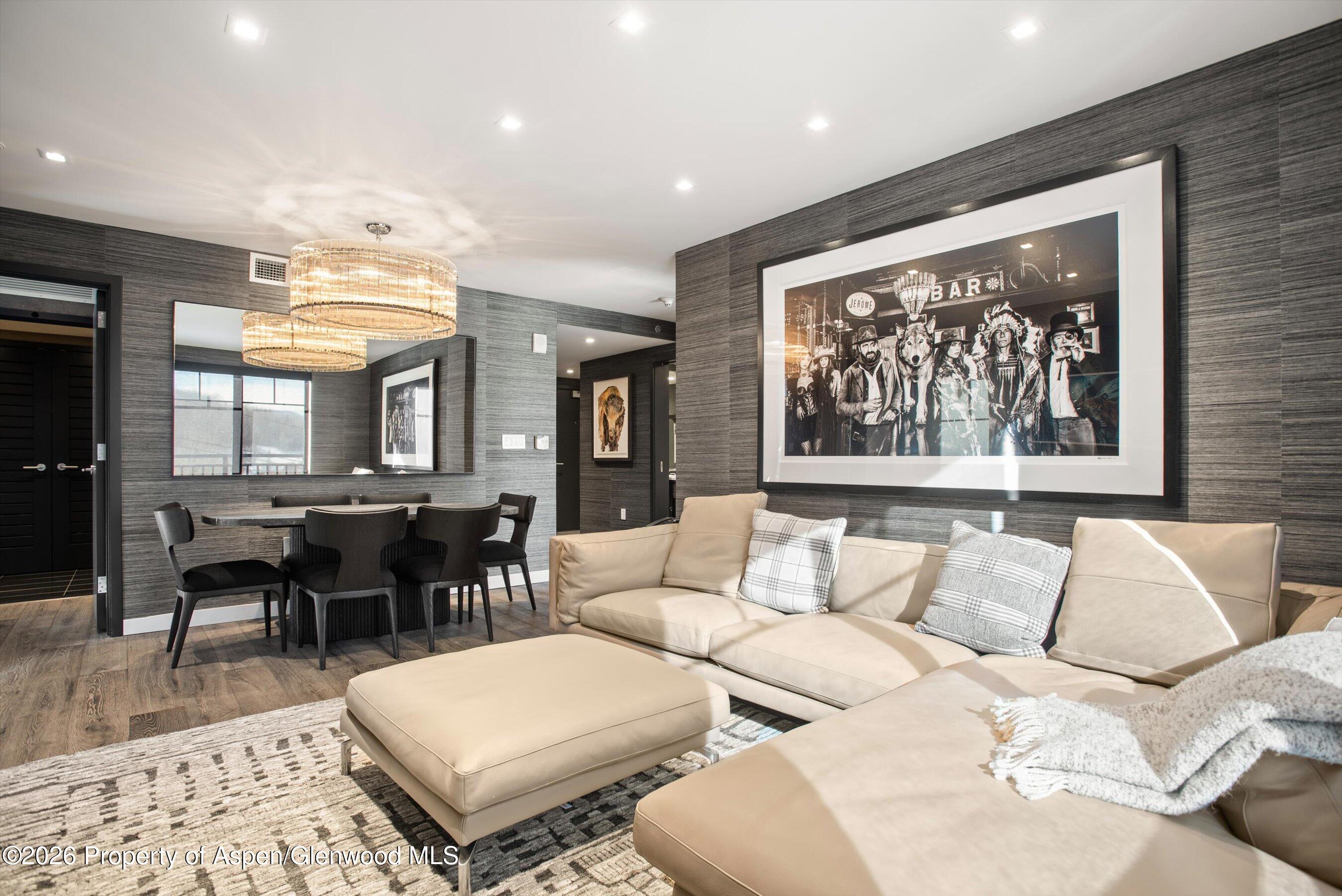 130 Wood Road, Unit 532 Snowmass Village, CO 81615 - Photo 2 of 15 a living room with furniture and a large window