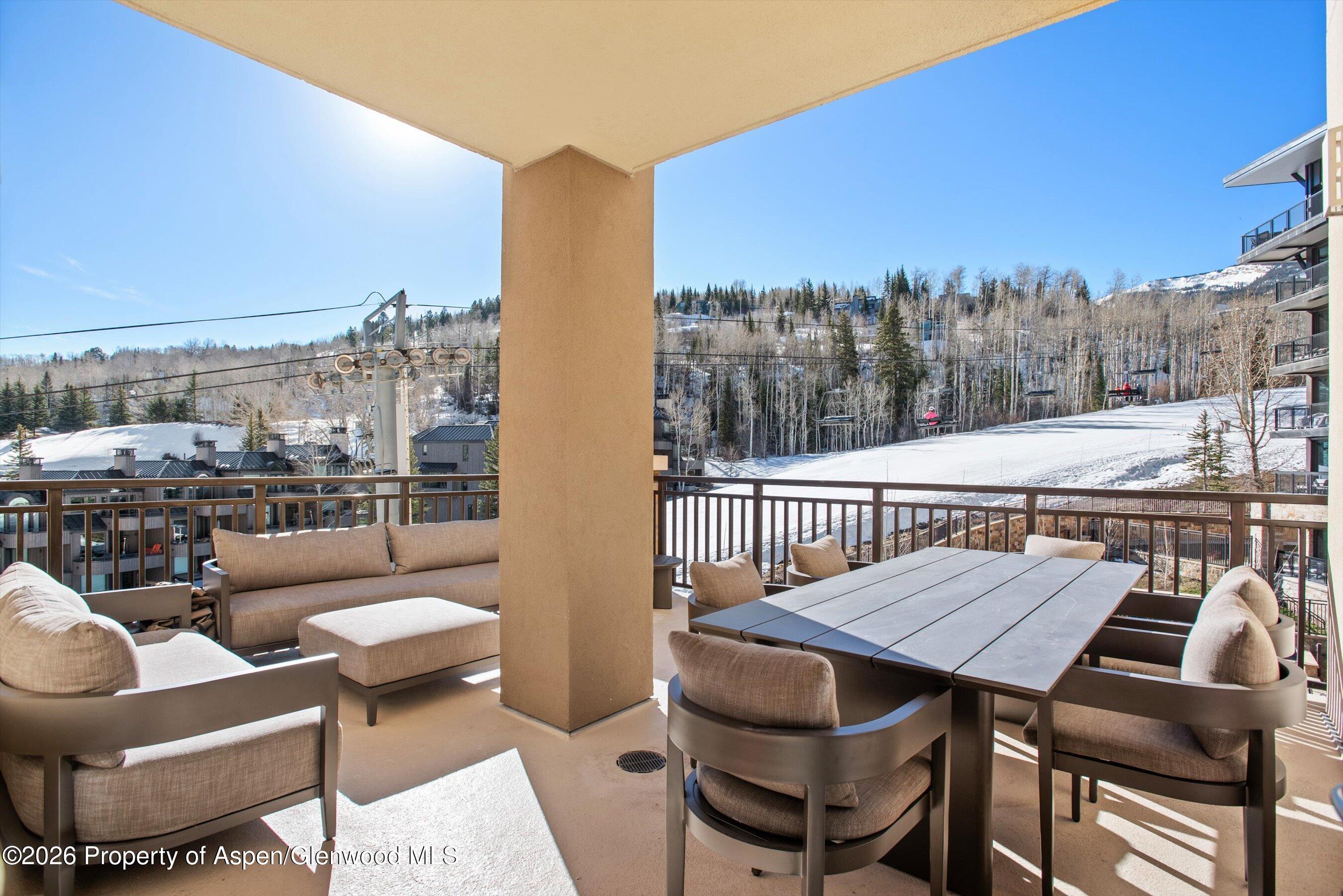 130 Wood Road, Unit 532 Snowmass Village, CO 81615 - Photo 4 of 15 a terrace of a house with outdoor seating