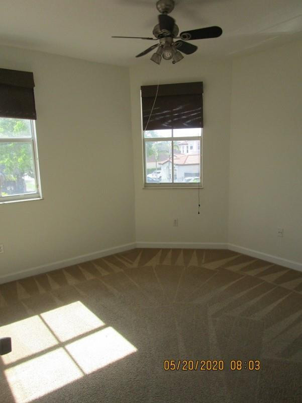1734 Southwest 151 Place Miami, FL 33185 - Photo 7 of 12 a view of an empty room with a window