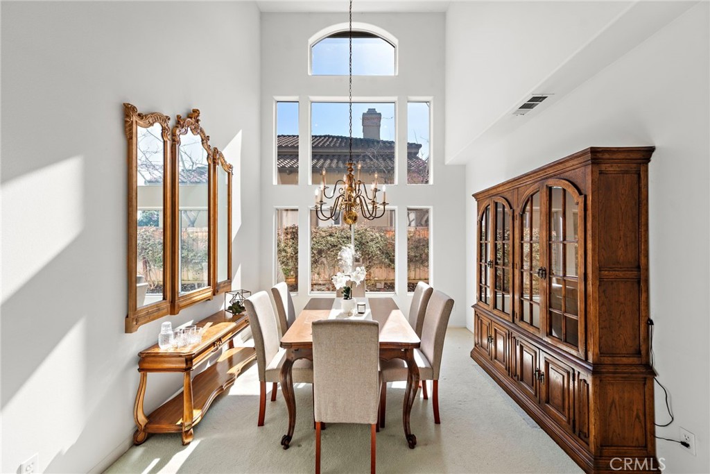 1775 Blackbird Circle Carlsbad, CA 92011 - Photo 10 of 32 a view of a dining room with furniture window and outside view