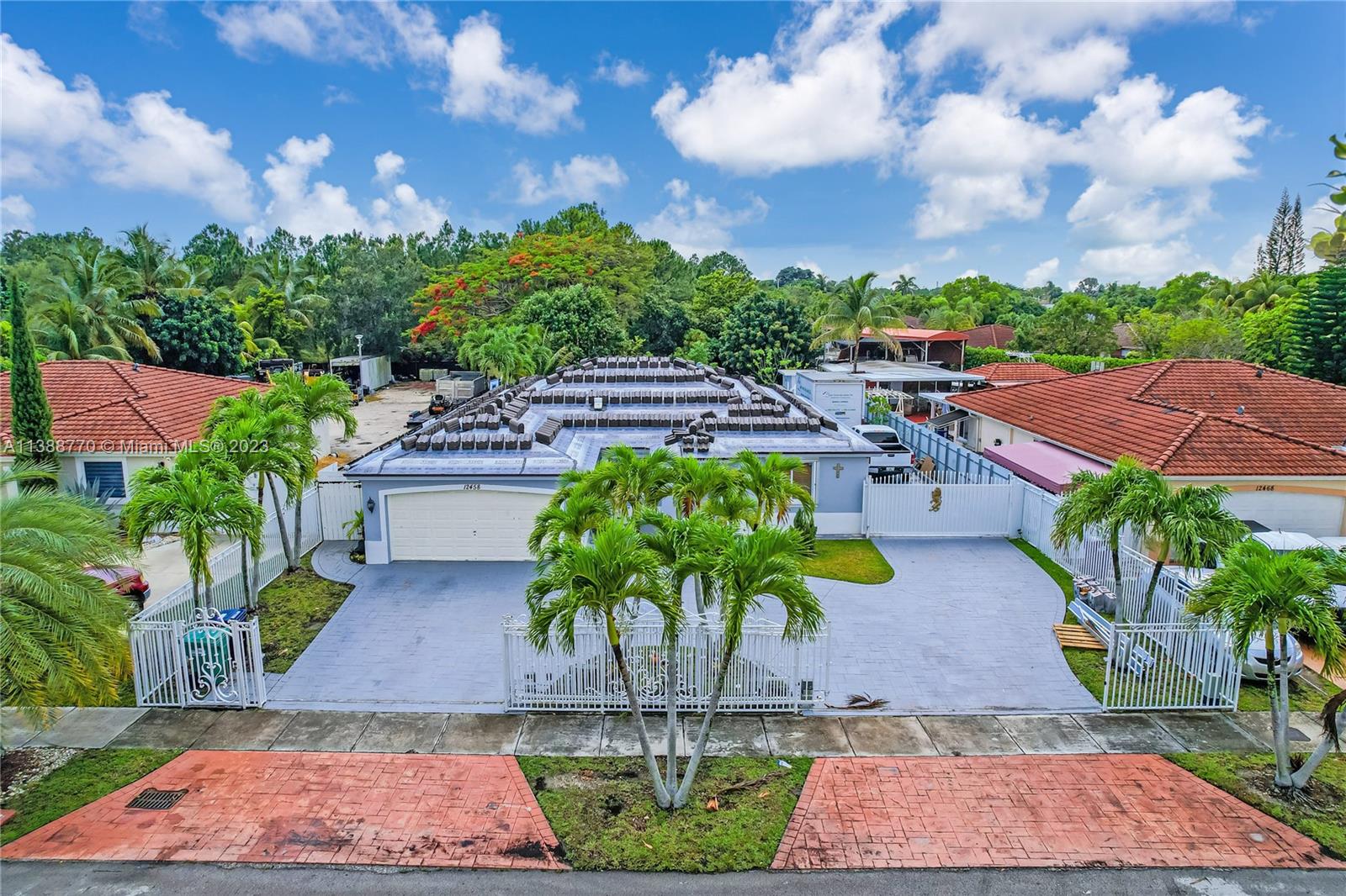 12458 Southwest 220th Street Miami, FL 33170 - Photo 3 of 25 a view of a yard with plants
