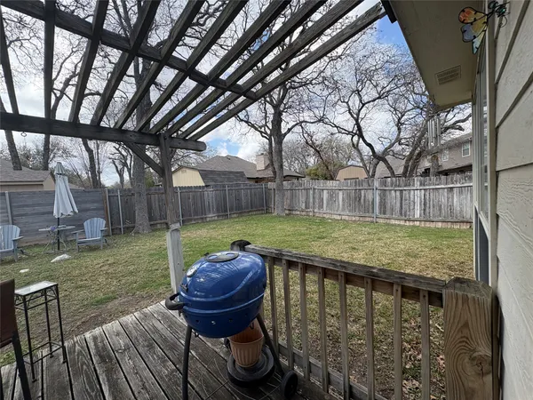 a view of swimming pool with a back yard