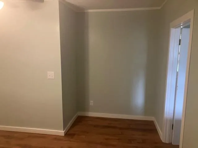 a view of a hallway with a white walls