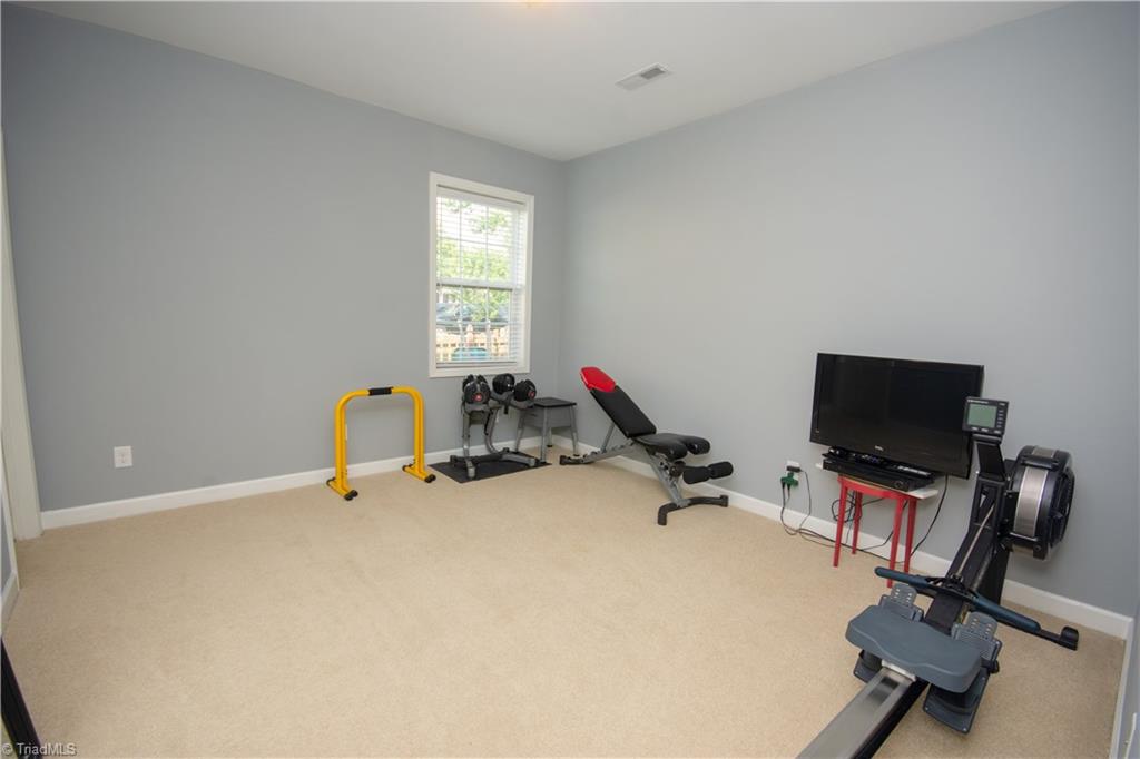 4608 River Valley Road High Point, NC 27265 - Photo 12 of 28 Hard to find main level bedroom with walk in closet and access to full bath!