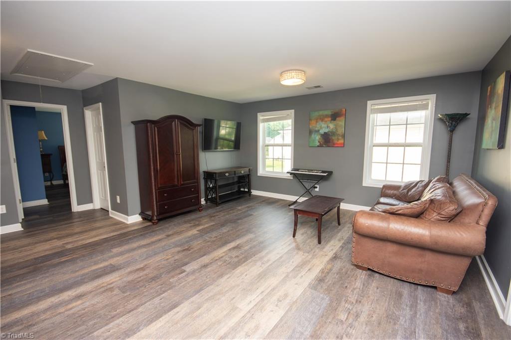 4608 River Valley Road High Point, NC 27265 - Photo 18 of 28 Upstairs, there are 3 secondary bedrooms and this huge loft that is perfect for the kiddo's hang out.