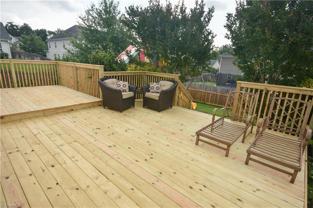 4608 River Valley Road High Point, NC 27265 - Photo 26 of 28 Expansive tiered deck with completely refinished deck surface and rail.