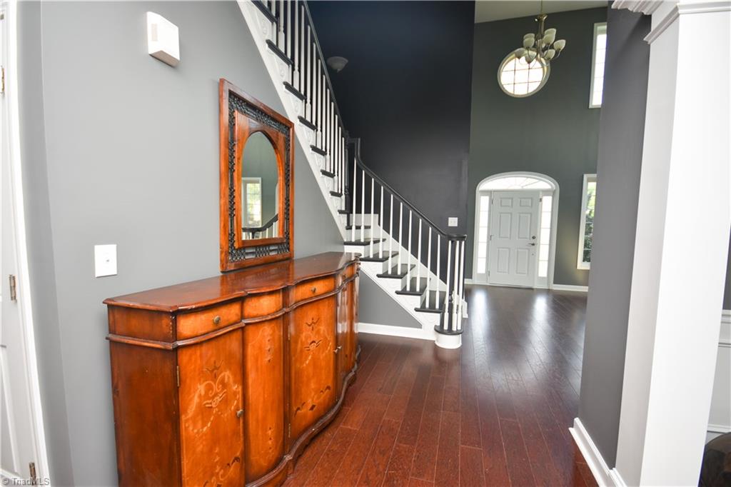 4608 River Valley Road High Point, NC 27265 - Photo 10 of 28 Hardwood flooring throughout the first floor family areas.