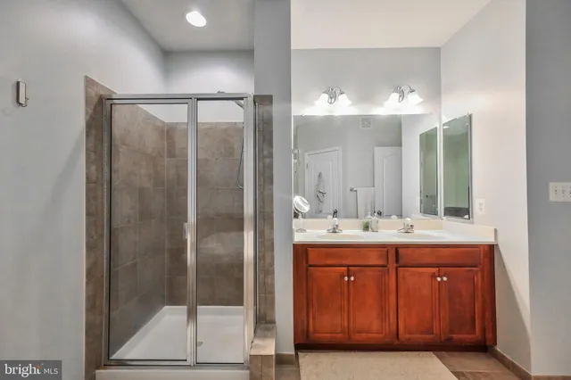 a living room with lots of books and a book shelf