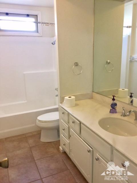 73100 Santa Rosa Way Palm Desert, CA 92260 - Photo 15 of 25 a bathroom with a sink a toilet and shower