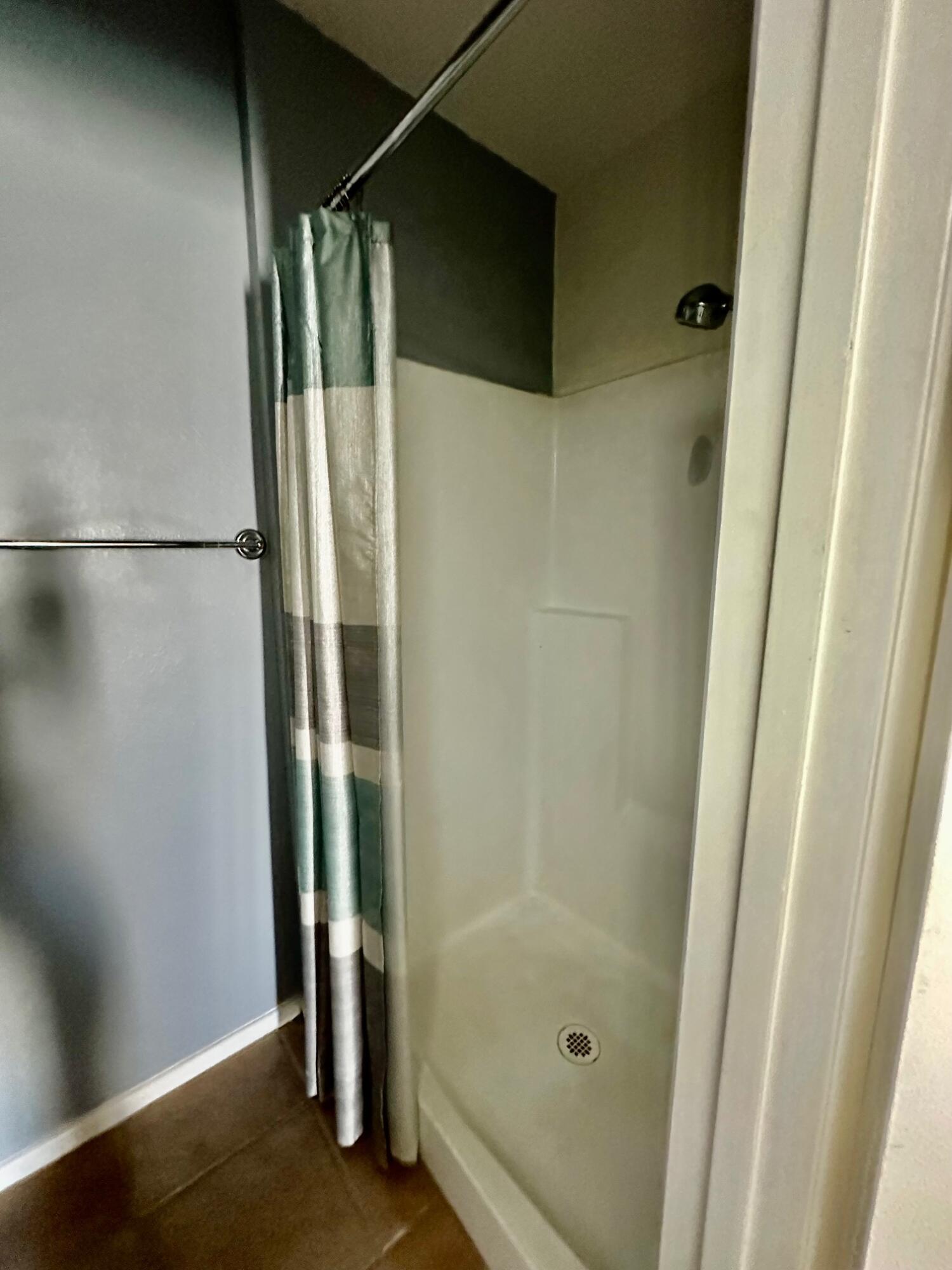 73100 Santa Rosa Way Palm Desert, CA 92260 - Photo 18 of 25 a bathroom with a glass door shower