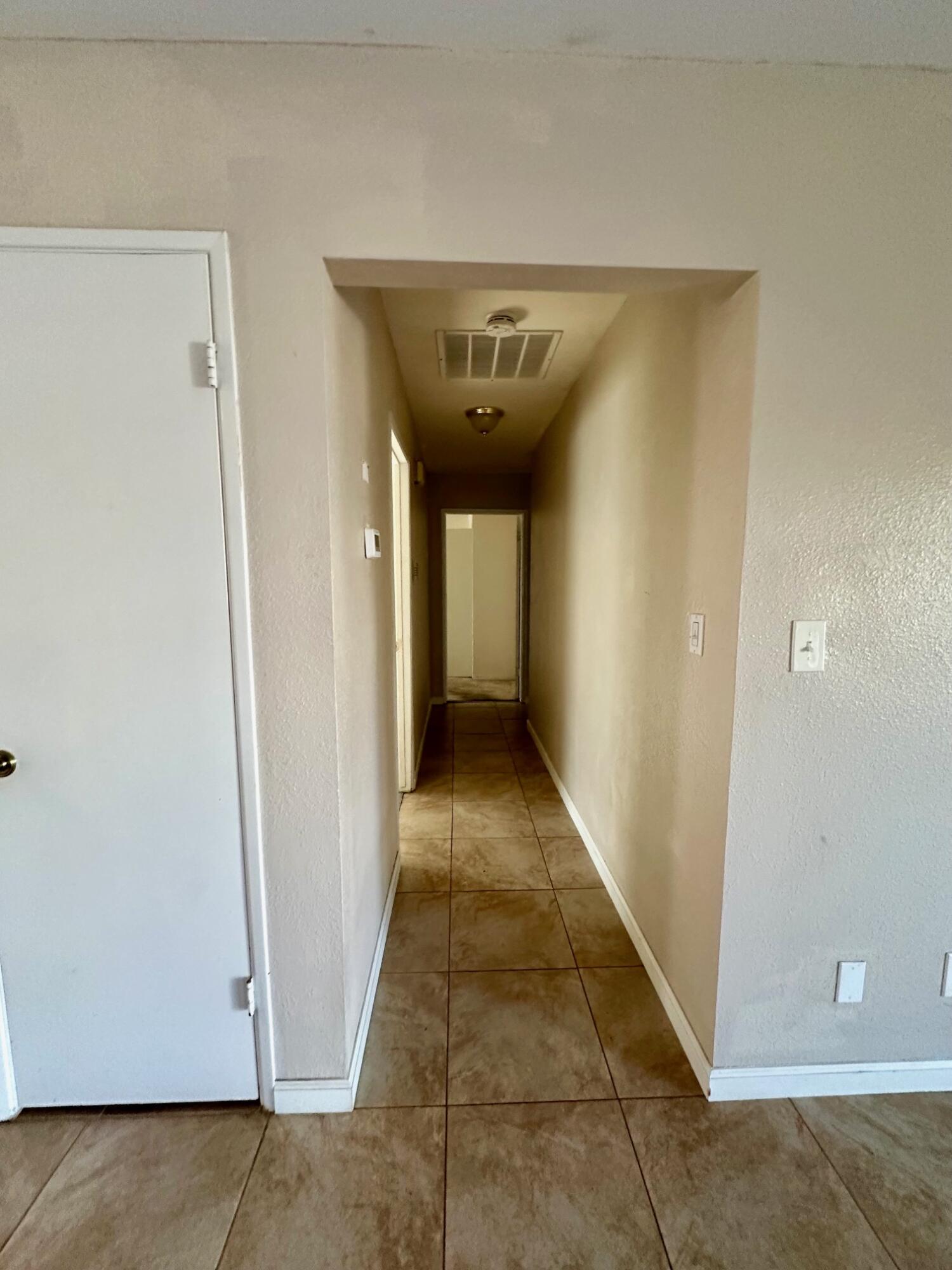 73100 Santa Rosa Way Palm Desert, CA 92260 - Photo 20 of 25 a view of a hallway