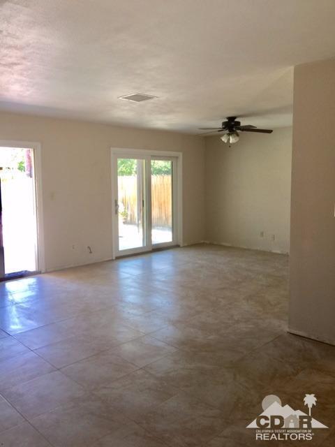 73100 Santa Rosa Way Palm Desert, CA 92260 - Photo 22 of 25 a view of an empty room with a window