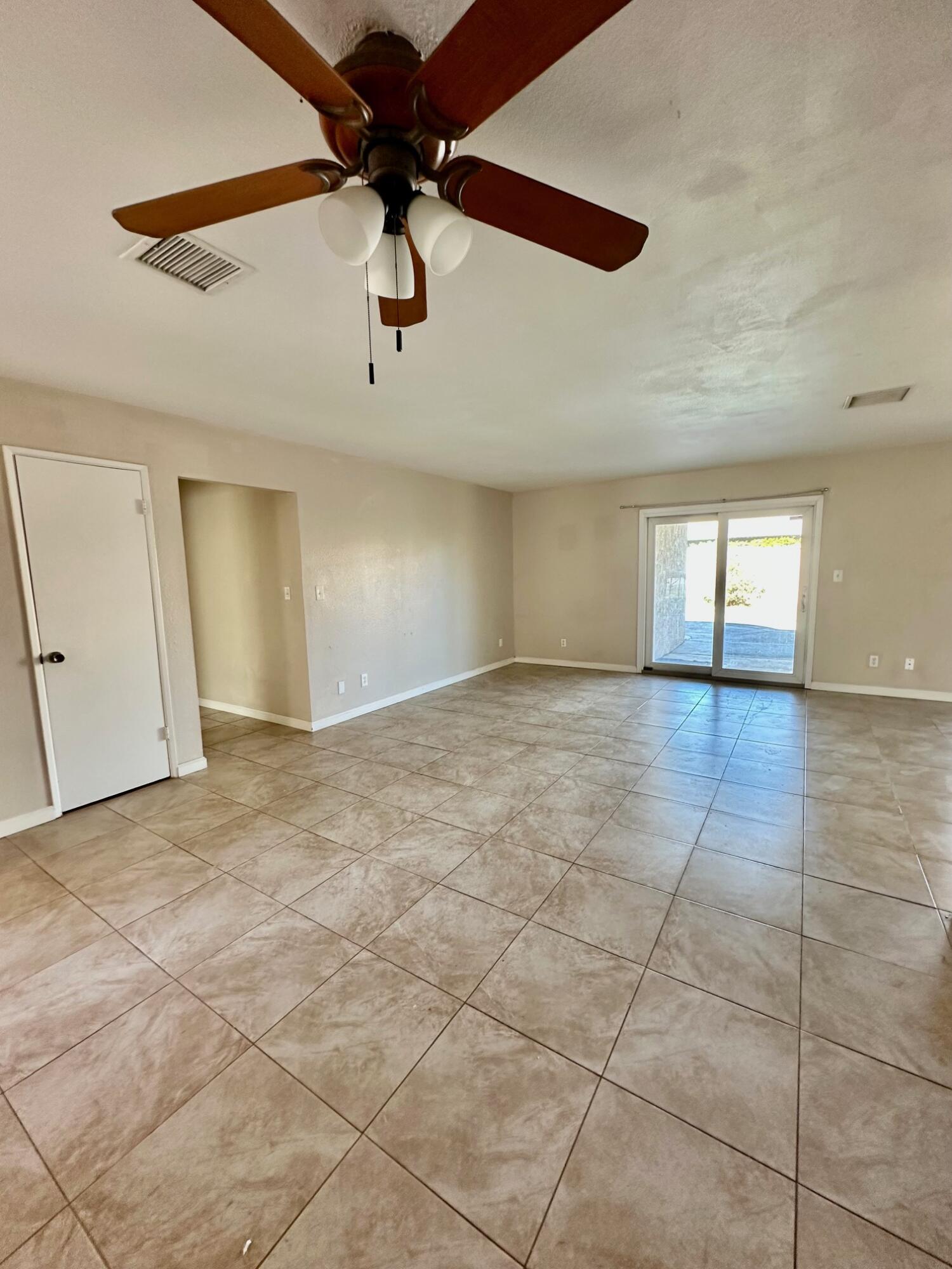 73100 Santa Rosa Way Palm Desert, CA 92260 - Photo 7 of 25 a view of an empty room with a window