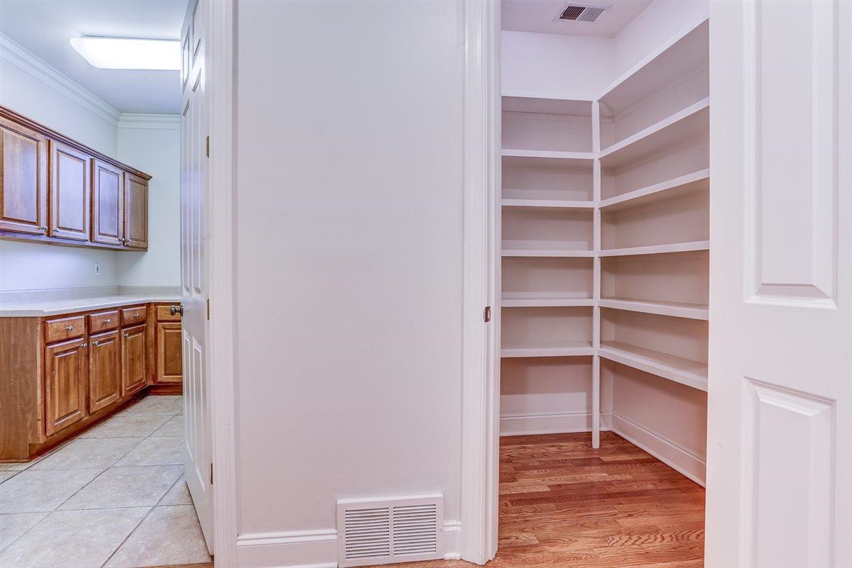 10219 Statfield Drive Collierville, TN 38017 - Photo 15 of 37 a view of cabinets and wooden floor