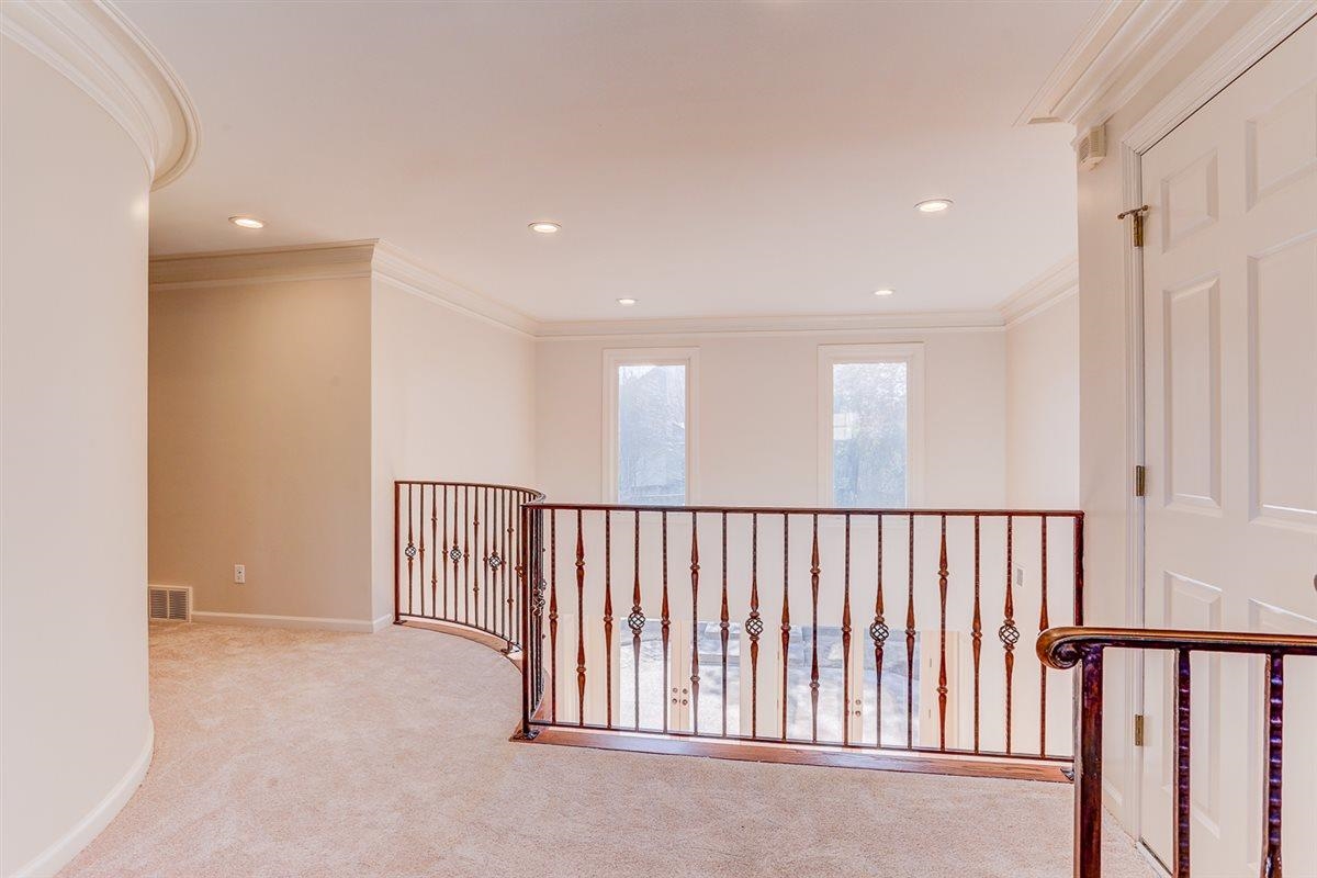 10219 Statfield Drive Collierville, TN 38017 - Photo 23 of 37 a view of a hallway with windows