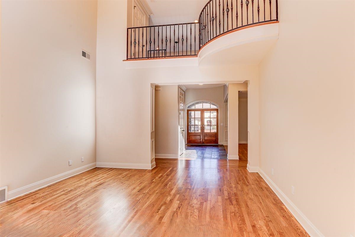 10219 Statfield Drive Collierville, TN 38017 - Photo 6 of 37 a view of a hallway view with wooden floor and staircase