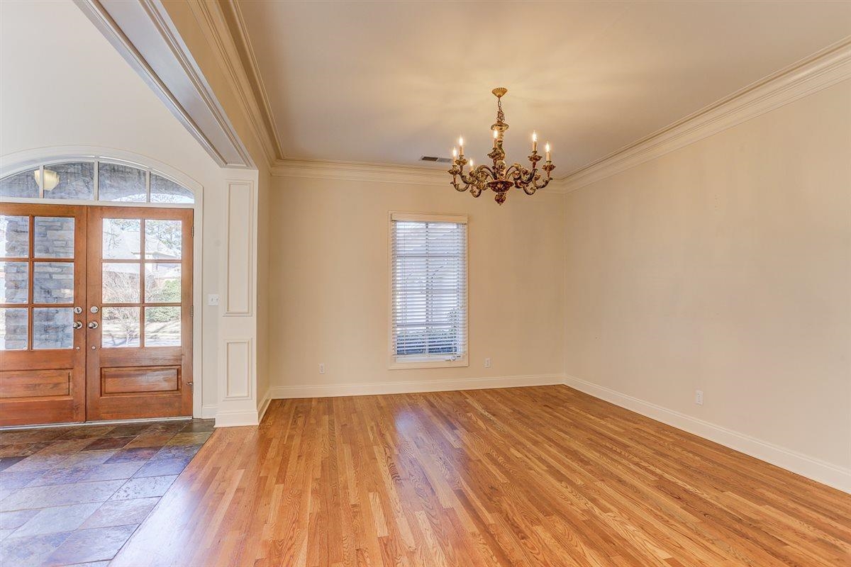 10219 Statfield Drive Collierville, TN 38017 - Photo 7 of 37 wooden floor in an empty room with a window