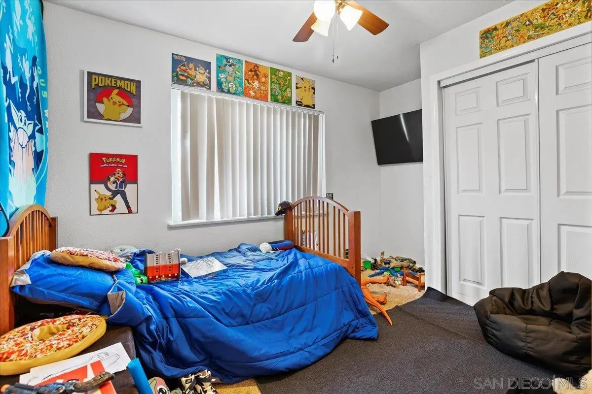 8719 Gardena Road Lakeside, CA 92040 - Photo 18 of 38 a bedroom with furniture and a window