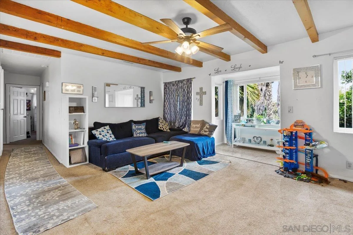 8719 Gardena Road Lakeside, CA 92040 - Photo 2 of 38 a living room with furniture and a wooden floor