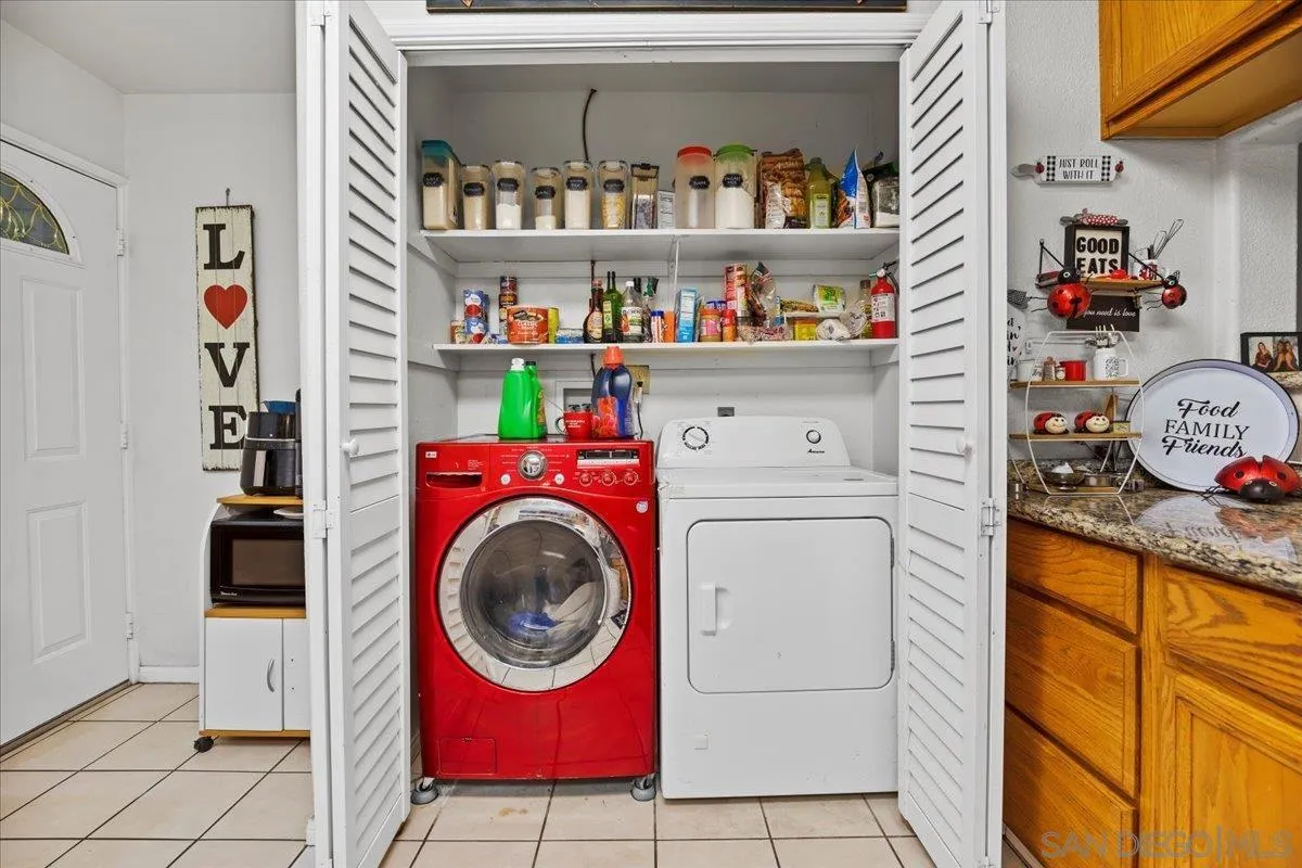 8719 Gardena Road Lakeside, CA 92040 - Photo 21 of 38 a utility room with dryer and washer
