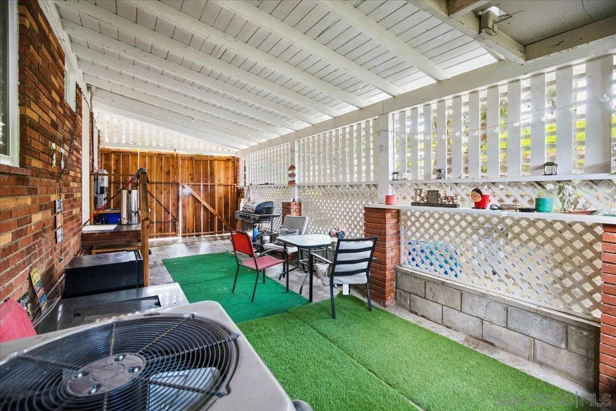 8719 Gardena Road Lakeside, CA 92040 - Photo 23 of 38 a bed room with a bed and a yard
