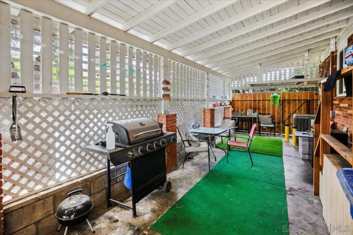 8719 Gardena Road Lakeside, CA 92040 - Photo 24 of 38 a view of a porch with chairs and backyard