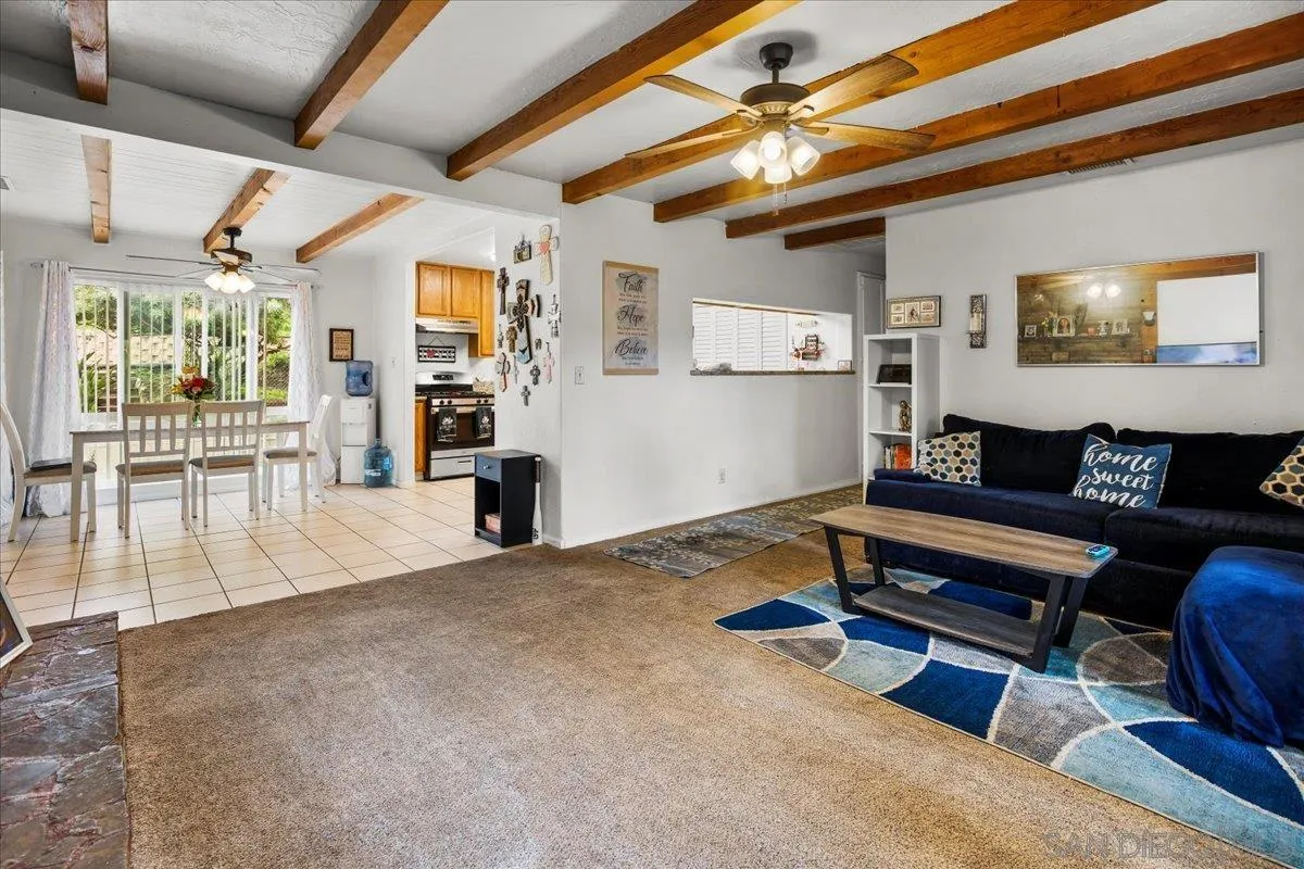 8719 Gardena Road Lakeside, CA 92040 - Photo 4 of 38 a living room with furniture and a wooden floor
