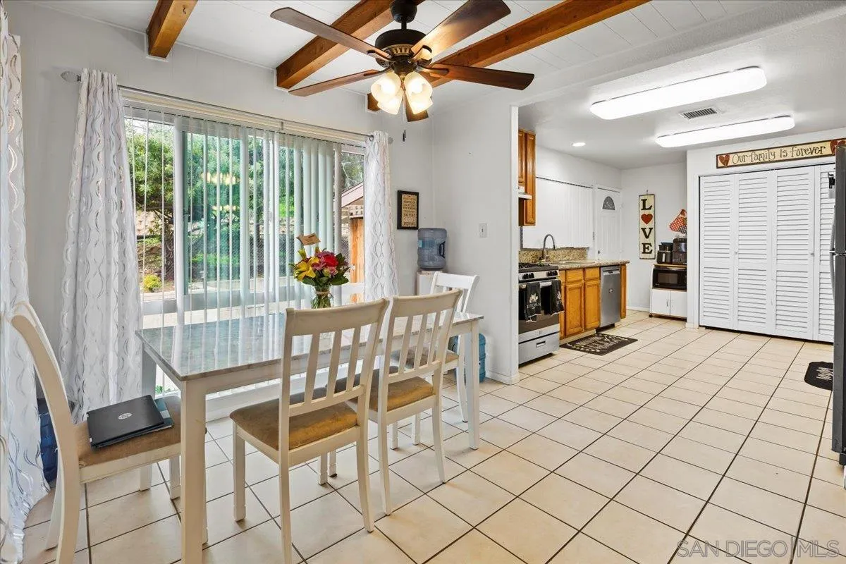 8719 Gardena Road Lakeside, CA 92040 - Photo 5 of 38 a view of a dining room with furniture window and outside view