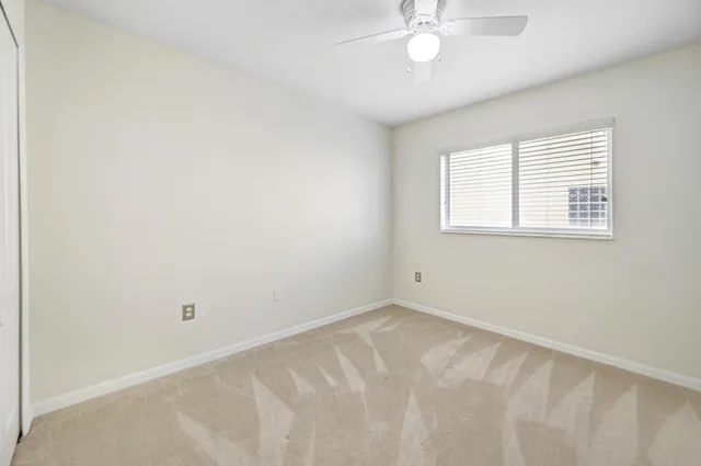 a view of a room with a window