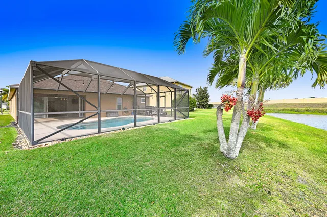 a view of a lake with a big yard