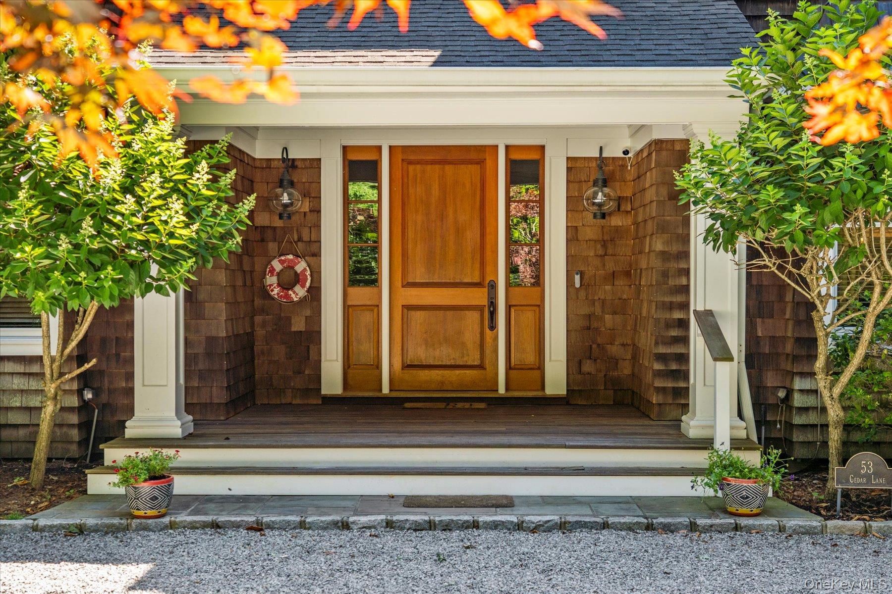 53 Cedar Lane West Remsenburg, NY 11960 - Photo 3 of 38 Doorway to property with a shingled roof