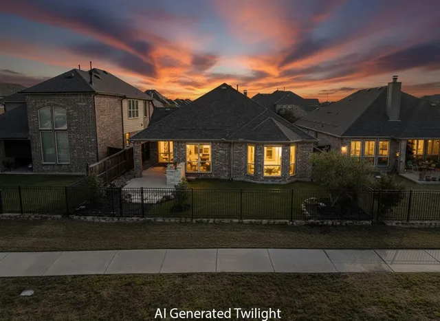 a front view of a house with a garden and plants