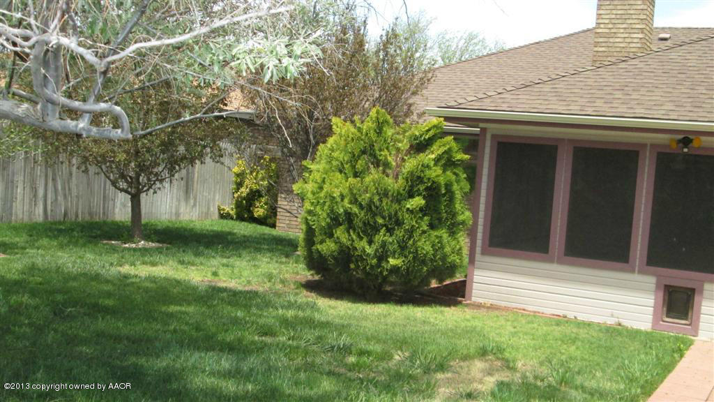 4211 Relatta Avenue Amarillo, TX 79110 - Photo 26 of 41 a view of a house with a garden