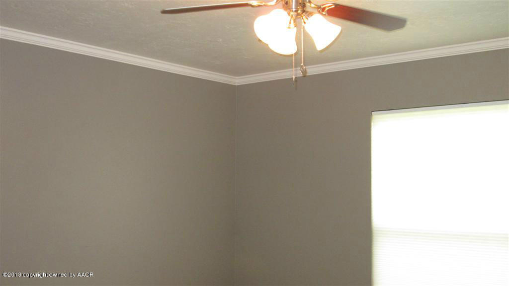 4211 Relatta Avenue Amarillo, TX 79110 - Photo 35 of 41 a view of a small space with a window