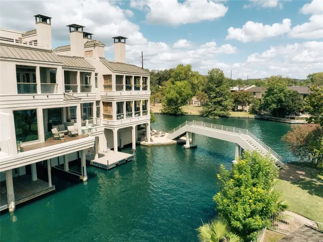a view of a lake with a building in the background