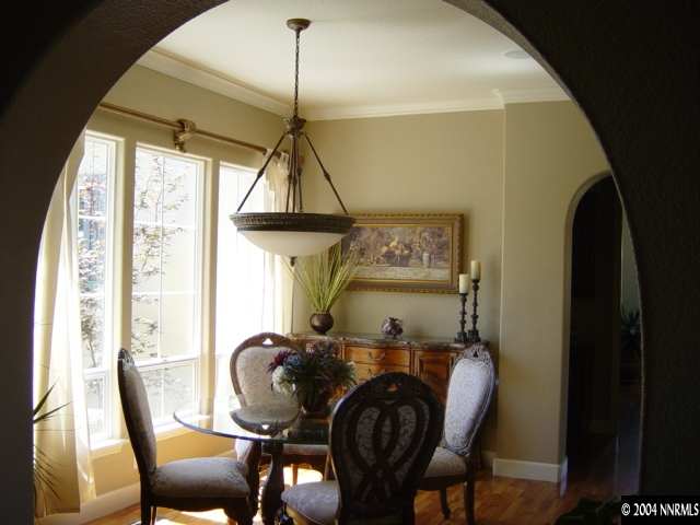 2928 Flint Ridge Court Reno, NV 89511 - Photo 4 of 5 a view of a dining room with furniture window and outside view