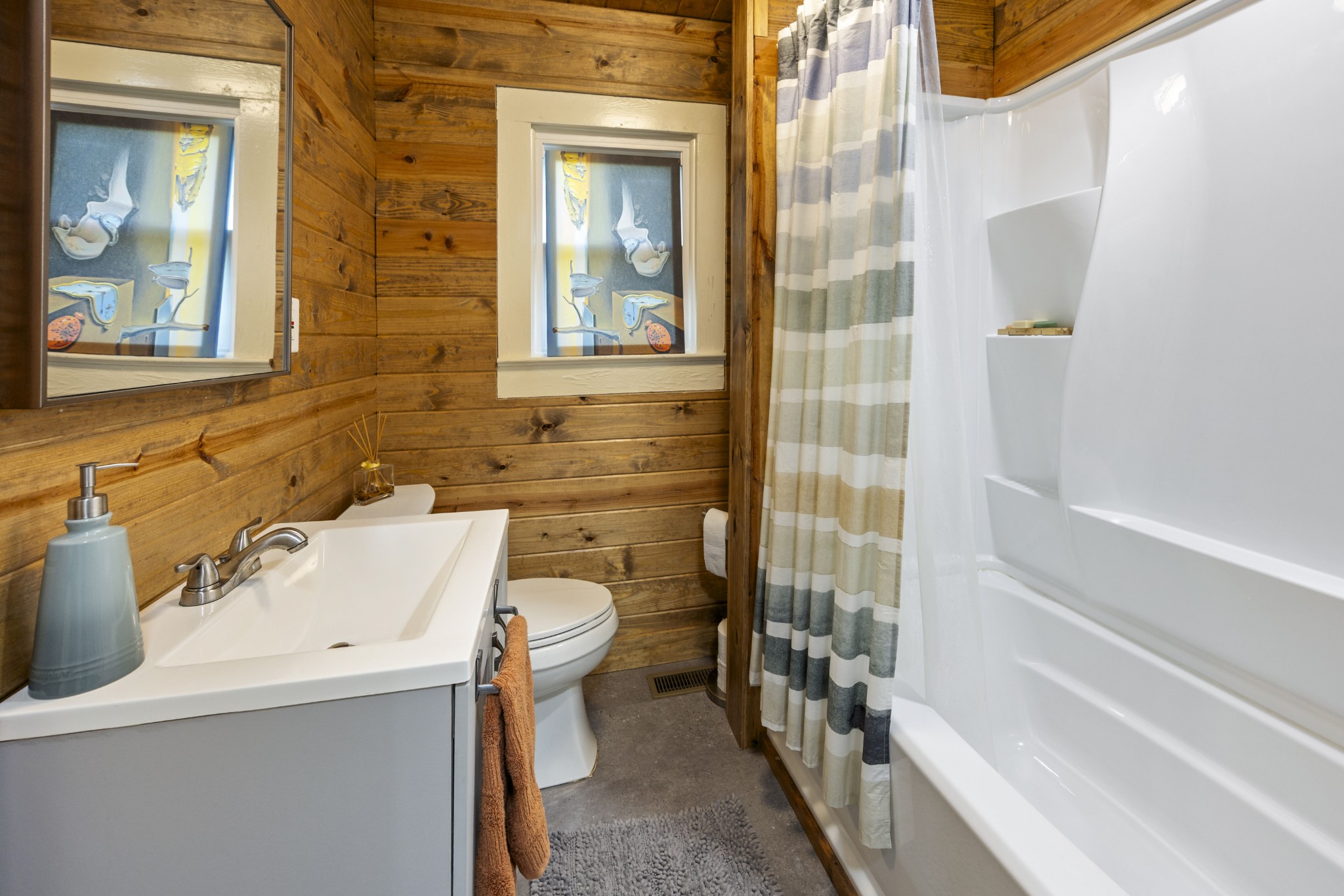 905 Nicholson Street Decherd, TN 37324 - Photo 15 of 27 a bathroom with a sink a toilet and shower