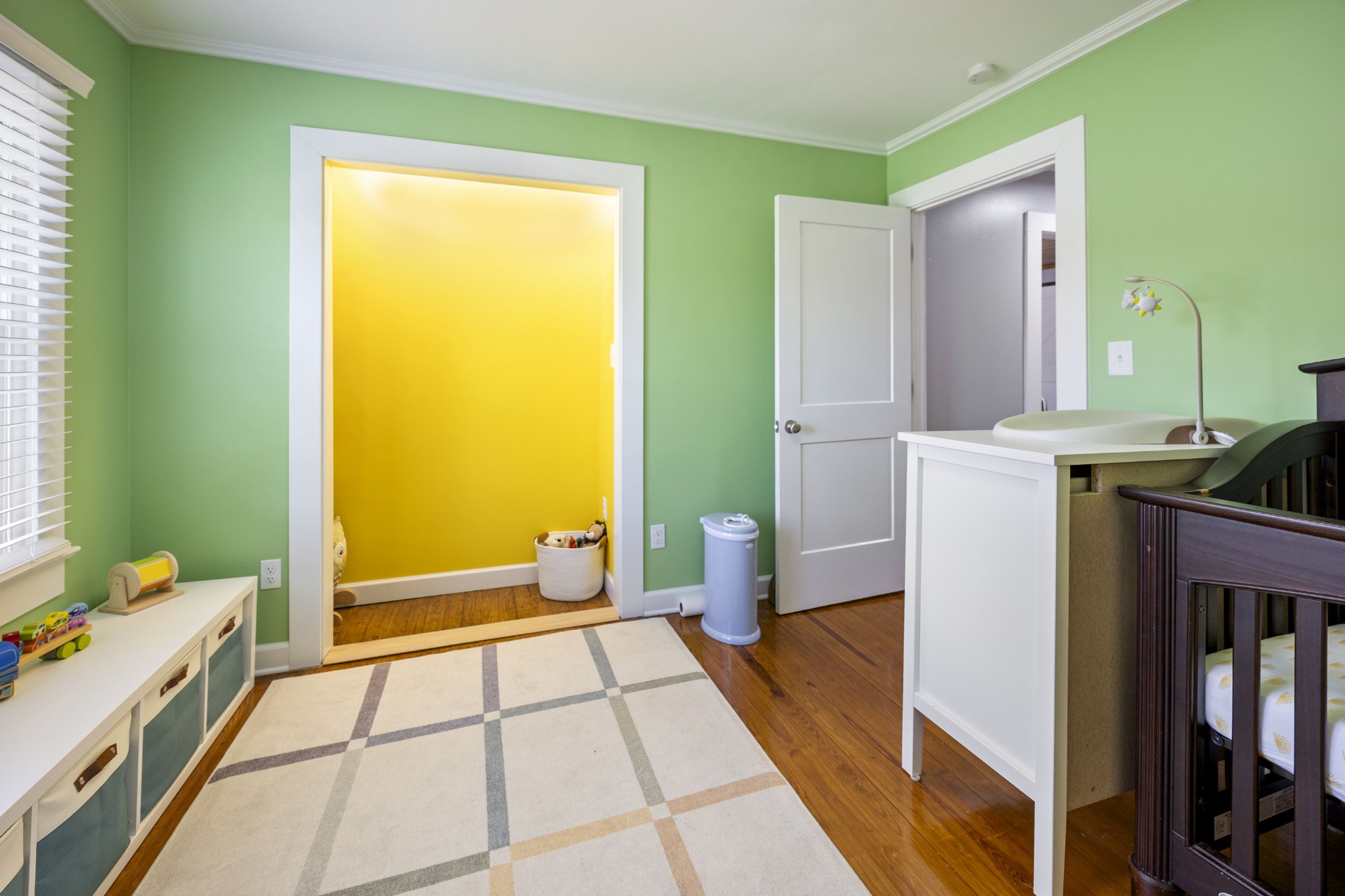 905 Nicholson Street Decherd, TN 37324 - Photo 19 of 27 a room with a baby bed furniture and a window