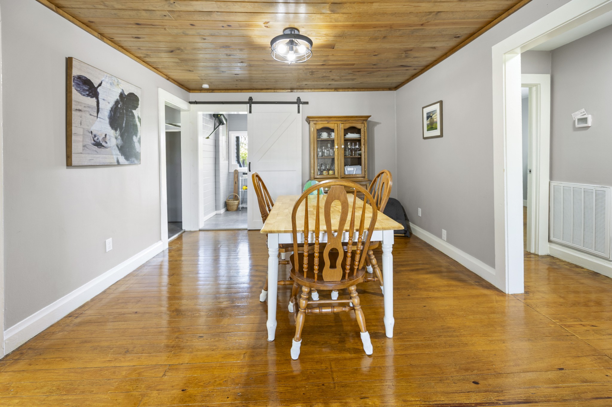 905 Nicholson Street Decherd, TN 37324 - Photo 6 of 27 a view of dining room with wooden floor