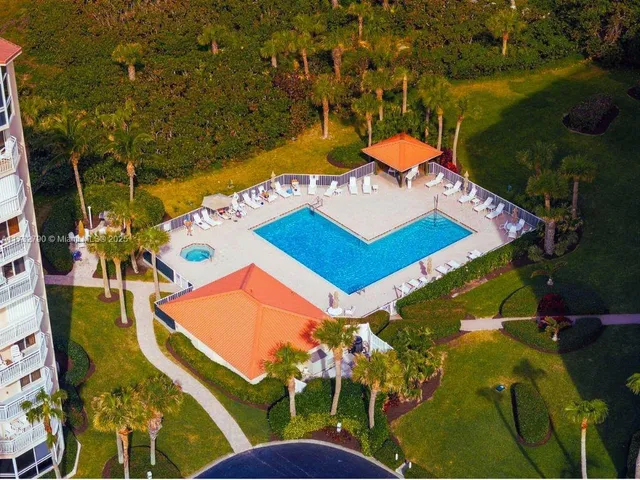 an aerial view of beach and ocean