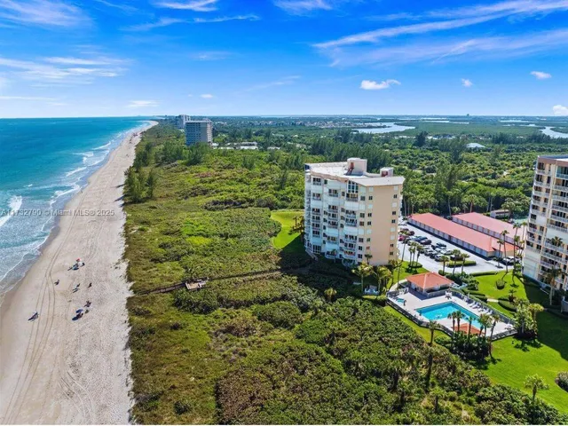 a view of a city with tall buildings