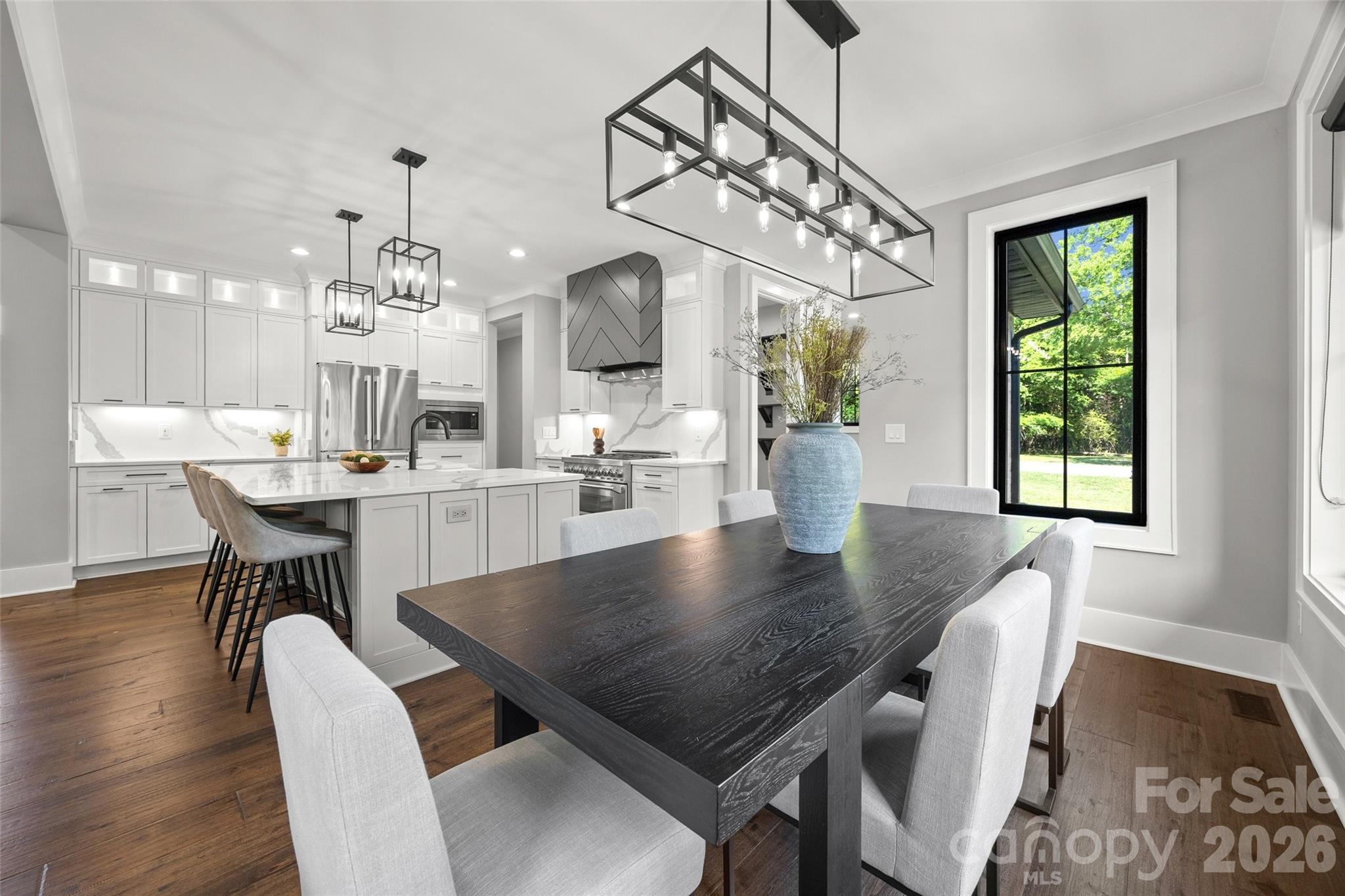 5438 Ralph Harper Lane Clover, SC 29710 - Photo 15 of 28 a view of a dining room with furniture window and wooden floor