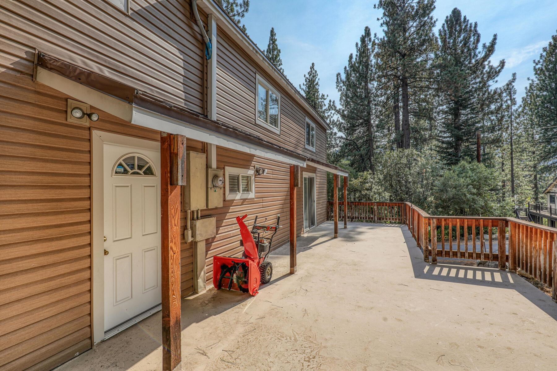 13746 Mogul Way Truckee, CA 96161 - Photo 14 of 21 a view of a patio with table and chairs and wooden floor