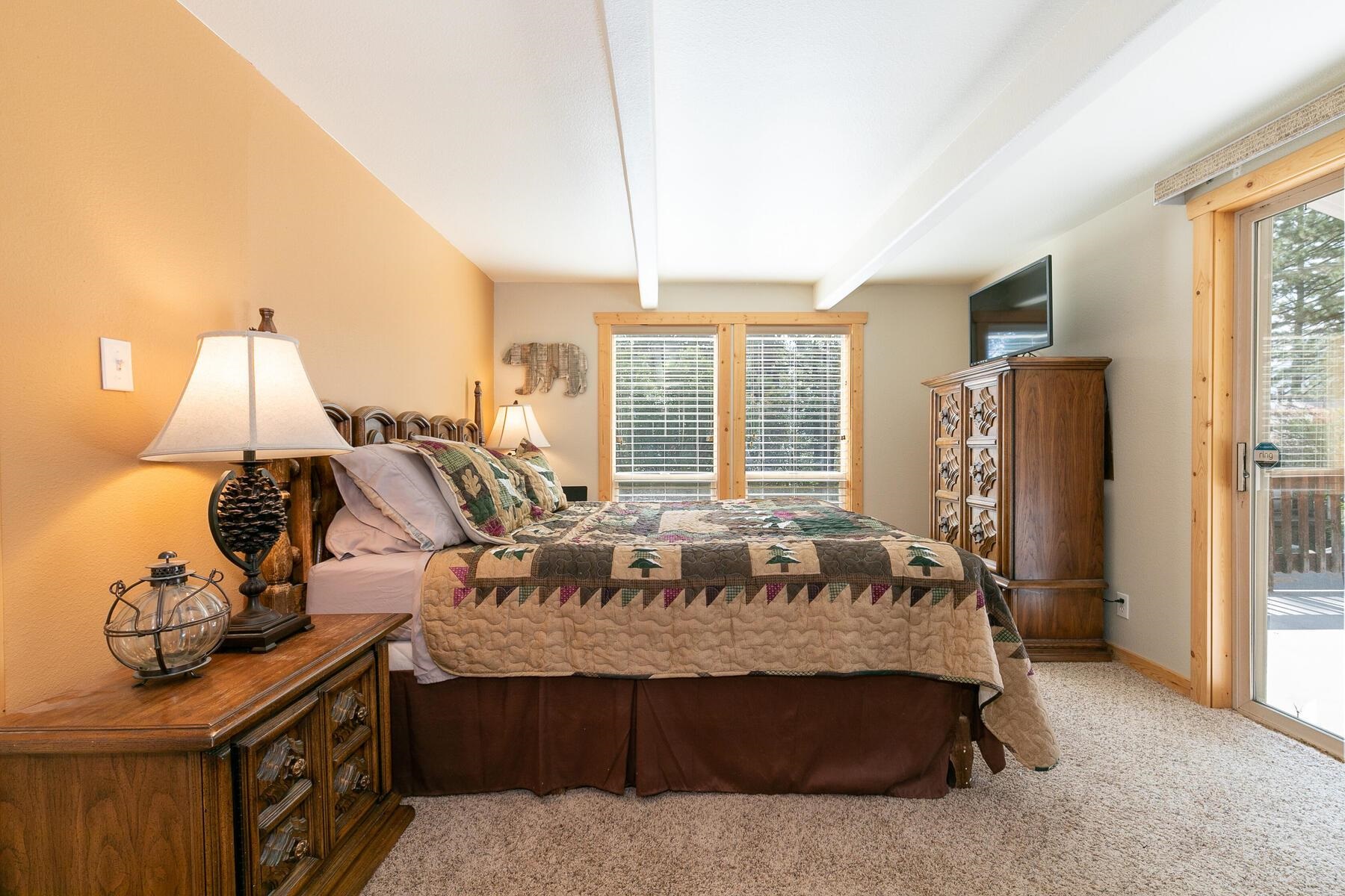 13746 Mogul Way Truckee, CA 96161 - Photo 16 of 21 a bed sitting in a room next to a window