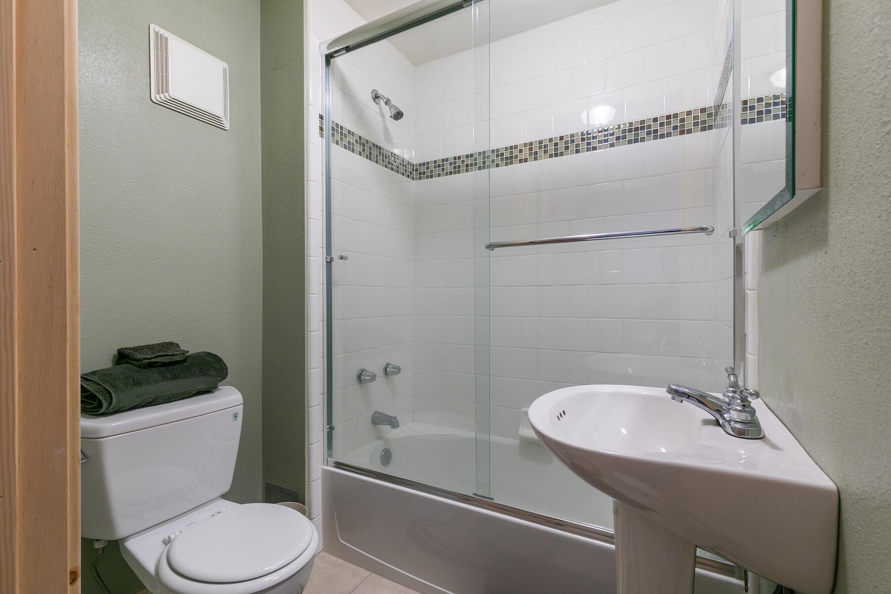 13746 Mogul Way Truckee, CA 96161 - Photo 5 of 21 a bathroom with a sink toilet and shower