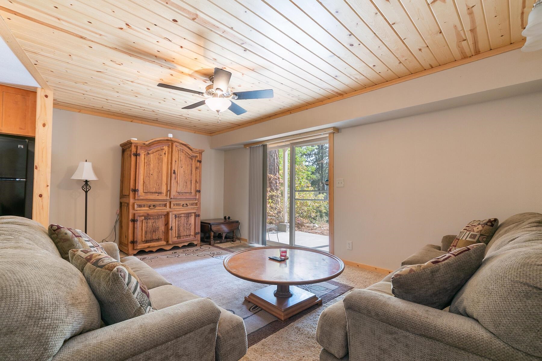 13746 Mogul Way Truckee, CA 96161 - Photo 8 of 21 a living room with furniture a ceiling fan and a rug