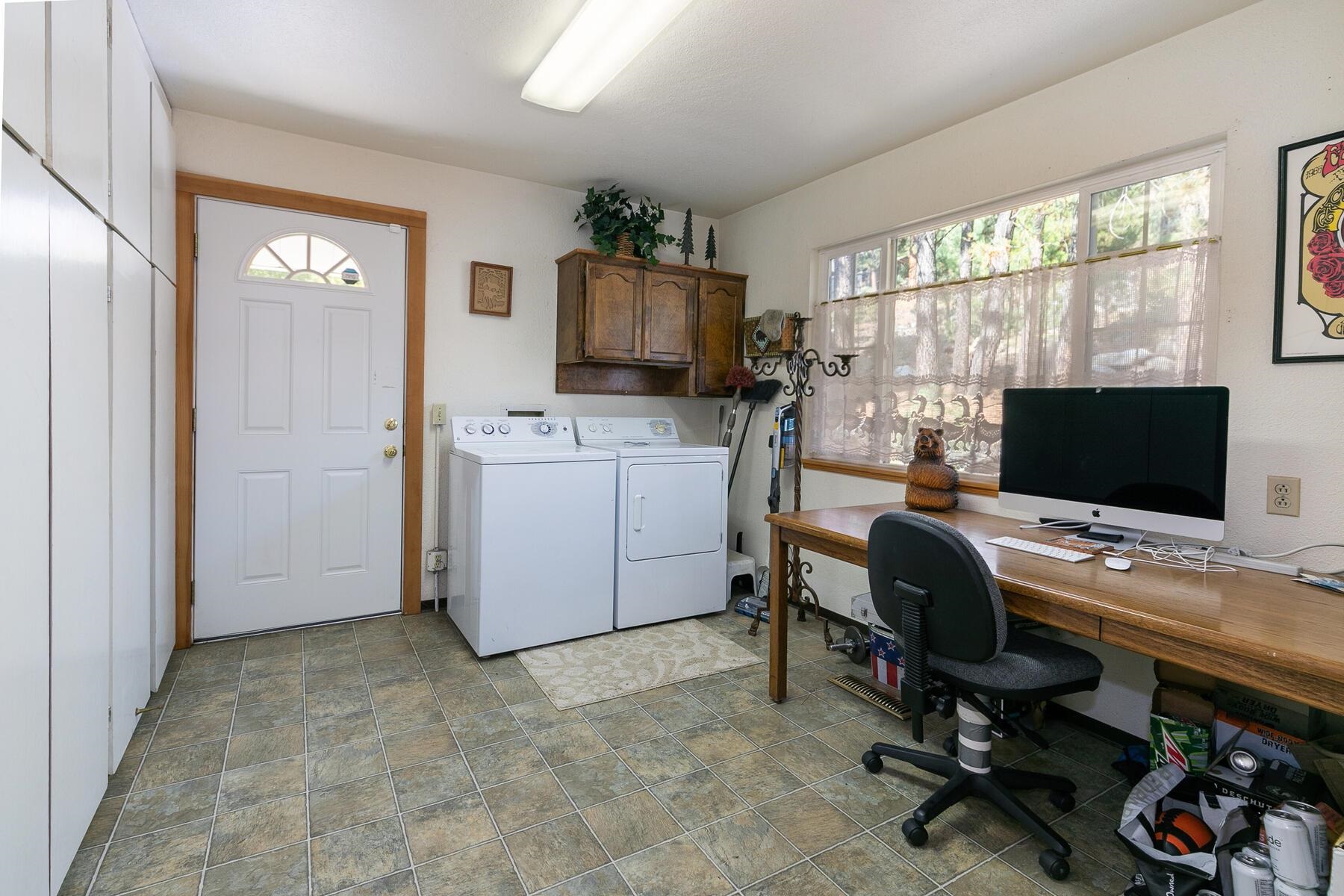 13746 Mogul Way Truckee, CA 96161 - Photo 9 of 21 a view of a workspace with furniture and a window