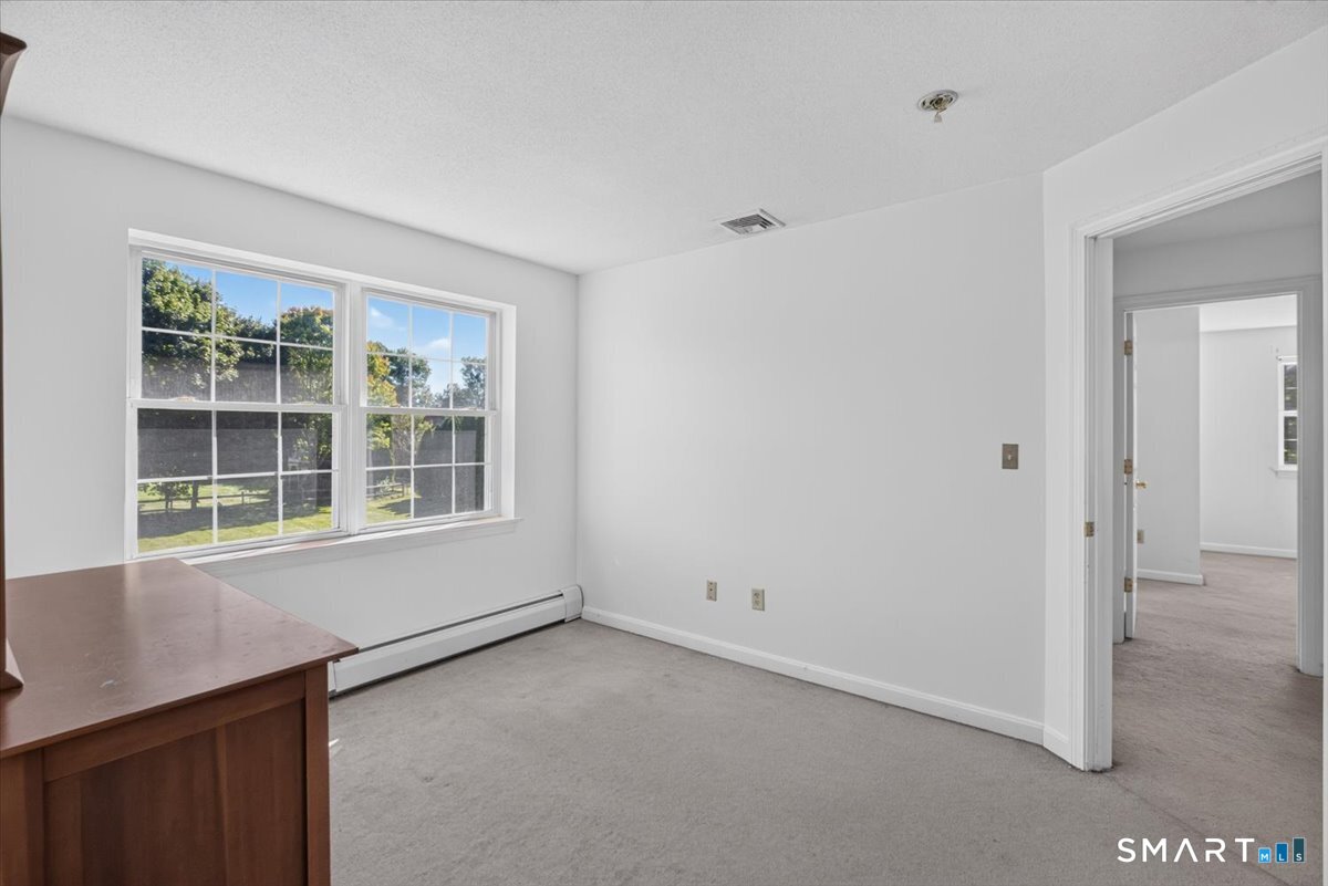 98 Broadleaf Circle Suffield, CT 06093 - Photo 25 of 35 third bedroom with views of the backyard