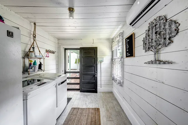 a kitchen with stainless steel appliances granite countertop a sink and cabinets