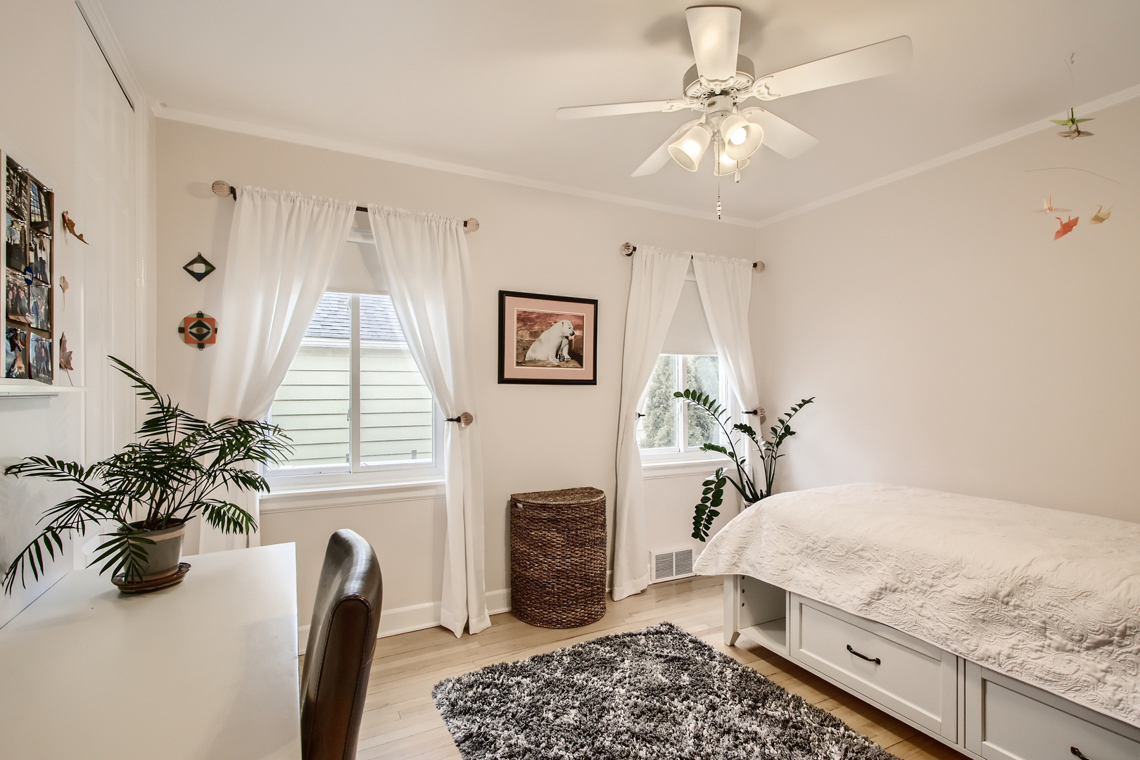 50 Northgate Road Riverside, IL 60546 - Photo 13 of 33 a bedroom with a bed furniture and a chandelier